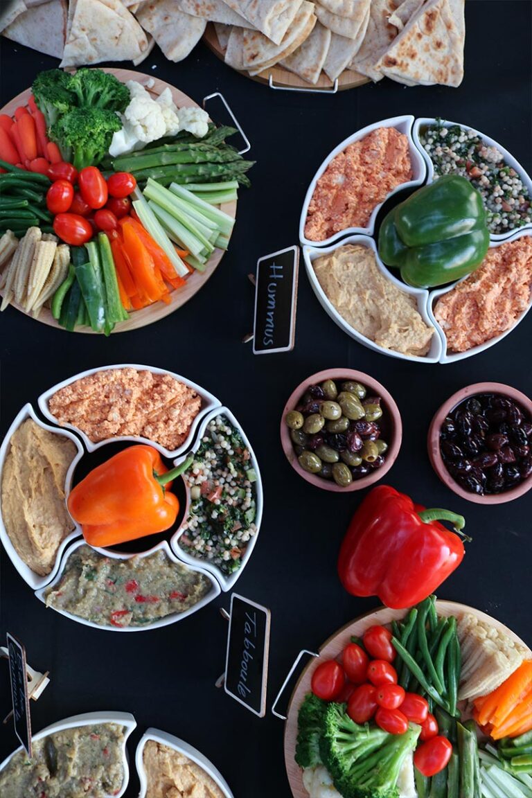 Guests enjoying a catered cocktail hour overlooking the Manhattan skyline