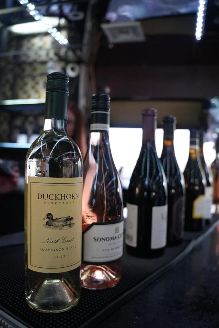 Professional catering staff serving cocktails at a private event in the Financial District